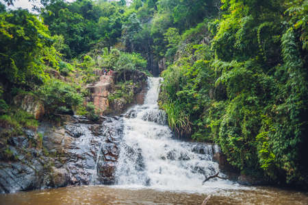 Beautiful cascading Datanla waterfall In the mountain town Dalat, Vietnam.
