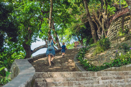 Mother and Toddler Son tourists in Vietnam. Po Nagar Cham Tovers. Asia Travel concept. Journey through Vietnam Concept.の写真素材