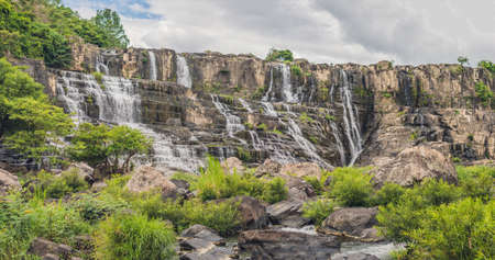 Large panorama of Amazing Pongour Waterfall is famous and most beautiful of fall in Vietnam. Not far from Dalat city estimate 45 Km. Dalat, Vietnam.の写真素材