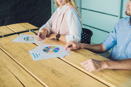 Young, attractive professionals having business training in the officeの写真素材