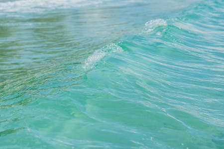 background blue tropical sea water ripples. waveの写真素材