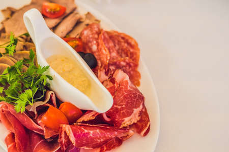 Catering service. Restaurant table with food. Huge amount of food on the table. Plates of food. Dinner time, lunch.の写真素材