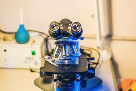 Optical microscope with four different objective lenses.の写真素材