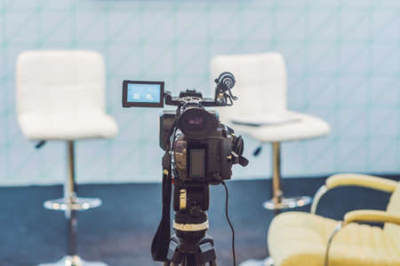 TV NEWS studio with camera and lights.の写真素材