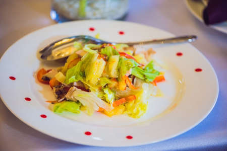 Salad in a plate. Catering service concept.の写真素材