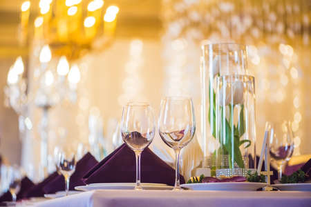 Empty glasses set in restaurant. Catering service concept.の写真素材