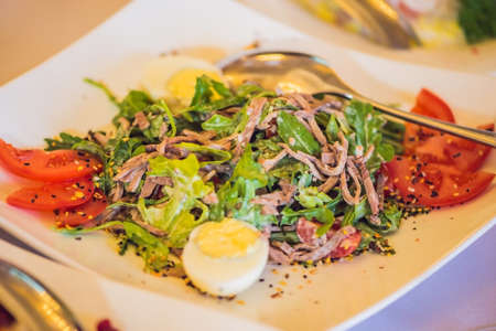 Salad in a plate. Catering service concept.の写真素材