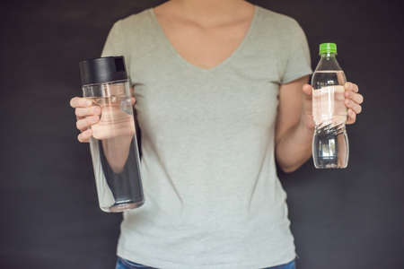 Zero waste concept Use a plastic bottle or a glass bottle. Zero waste, green and conscious lifestyle...