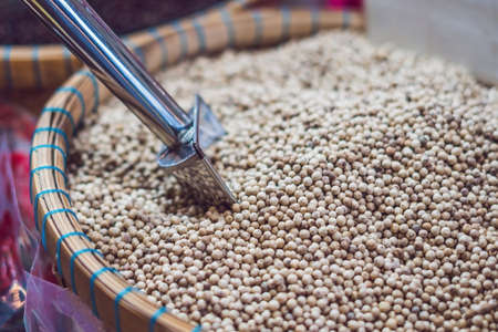 White pepper in a basket on the market.の写真素材