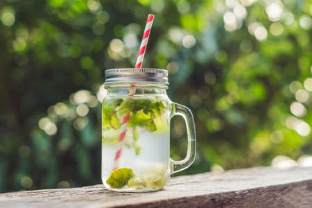 Water with mint and lime. Drink more water concept.