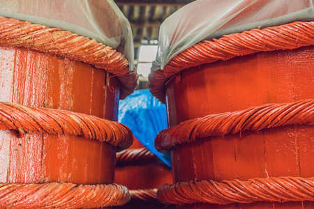 Wooden barrels in a fish sauce factory on Phu Quoc island.