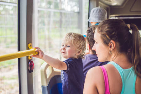 Mom and son go by bus. Traveling with children concept.の写真素材