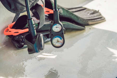 Equipment for diving and underwater compass are ready to dive.の写真素材