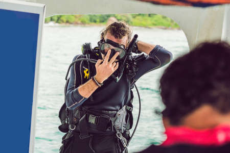 Diver preparing to dive into the sea.の写真素材