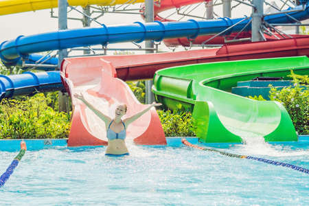 woman is having fun in the water park.の写真素材