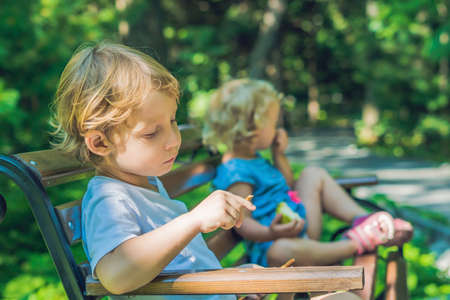 Conflict on the playground, resentment, Boy and girl quarrel.の写真素材