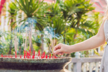 Smell the smoke of Incense, The smoke of joss stick in temple, smoke of incense in the spirit shrine.の写真素材
