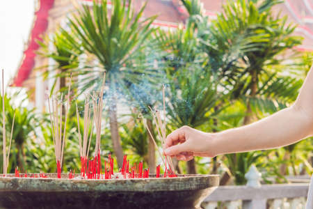 Smell the smoke of Incense, The smoke of joss stick in temple, smoke of incense in the spirit shrine.の写真素材