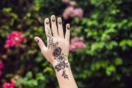Picture of human hand decorated with henna Tattoo. mehendi hand.の写真素材