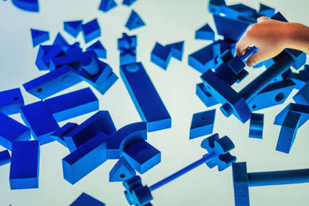 Blue children's design kit on a luminous table.の写真素材