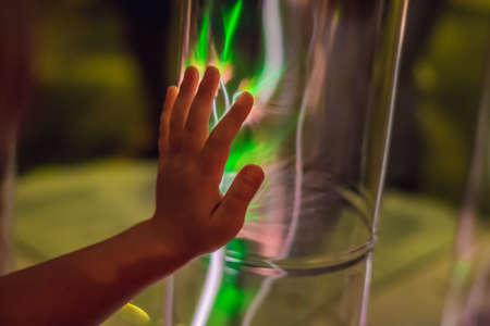 Closeup of an electric energy plasma sphere. Glowing electrostatic ball. Copyspace. Science power demonstration.の写真素材