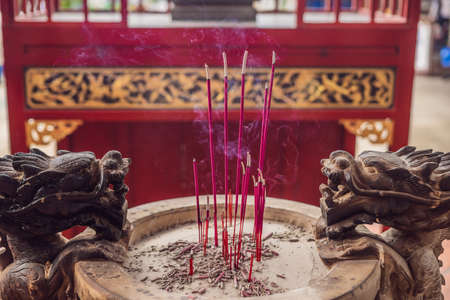 Temple of snakes with real snakes inside on the island of Penang, Malaysia.の写真素材