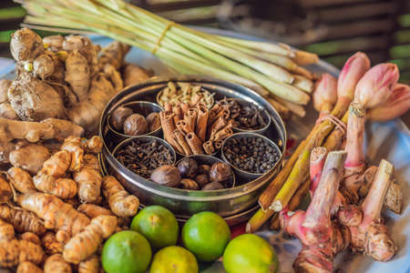 Set of Asian spices: ginger, cinnamon, lime clove pepper nutmeg