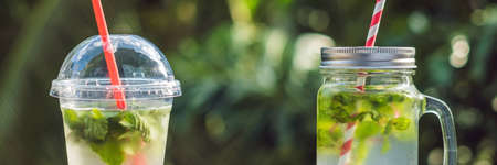 Zero waste concept Use a plastic glass or mason jar. Zero waste, green and conscious lifestyle concept. Reusable on the go drink container ideas. BANNER, long formatの写真素材