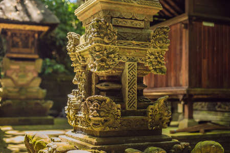 Stutue in Sacred Monkey Forest, Ubud, Bali Indonesiaの写真素材