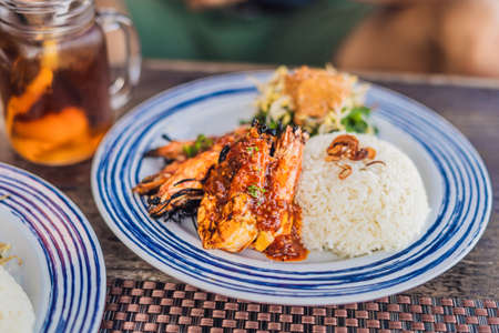 Close up Grilled prawns or fresh grilled shrimps ,cooking seafood with rice.の写真素材