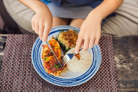 Squid grill with rice. Balinese cuisine Indonesia.の写真素材
