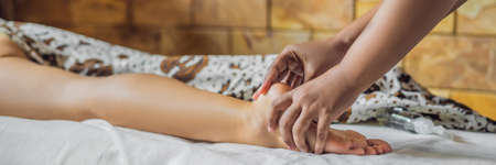 Total relaxation. Beautiful Young Woman Get Balinese or Thai Massage.