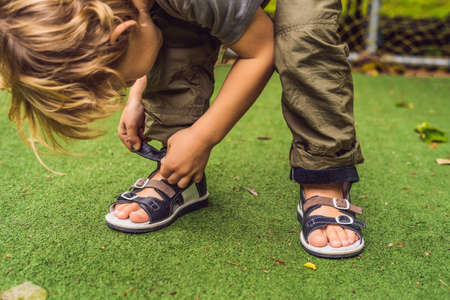 children's orthopedic shoes on the boy's feet.の写真素材