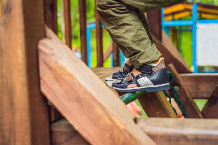 children's orthopedic shoes on the boy's feet.の写真素材