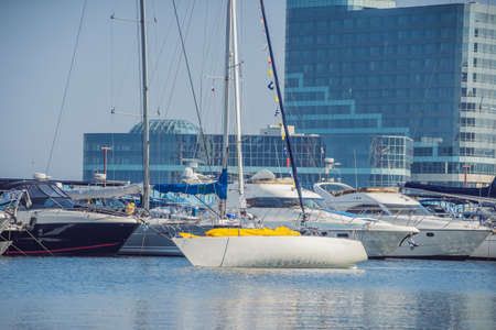 Yachts parking in harbor at sunset, Harbor yacht club.の写真素材