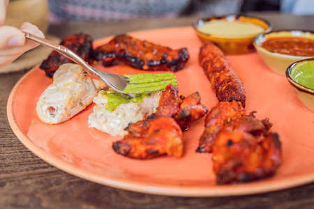 Indian cuisine-Famous Indian mutton or lamb curry dish in a cast iron cookware. Selective focus photograph.の写真素材