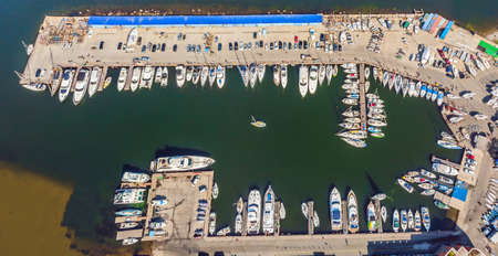 Yachts parking in harbor at sunset, Harbor yacht club.