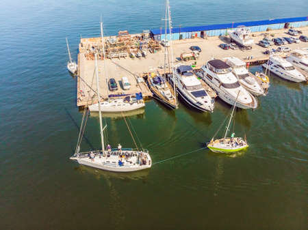 Yachts parking in harbor at sunset, Harbor yacht club