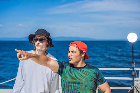 Camera operator, director and dp discuss the process of a commercial video shoot