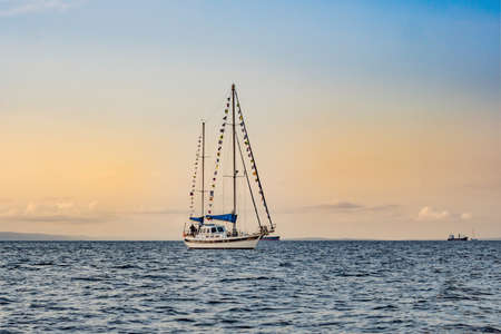 Sailboats on the  sunset over the sea