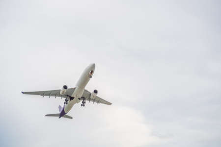 Plane in the sky taking off or landing