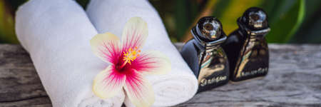 hotel amenities kit spa, soap, shampoo, towels BANNER, long formatの写真素材