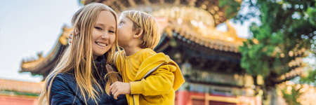 Enjoying vacation in China. Mom and son in Forbidden City. Travel to China with kids concept. Visa free transit 72 hours, 144 hours in China BANNER, LONG FORMATの写真素材