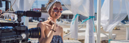 Female blogger is going to record video BANNER, LONG FORMATの写真素材