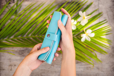 Notepad and stationery on wooden background. Planner for business and study. Fans of stationeryの写真素材