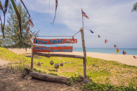 Natural tropical sandy beach and calm sea landscape with trees and blue sky
