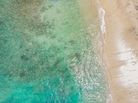 Sea bay with turquoise water and a small white beach.の写真素材