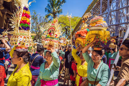 Ubud, Bali, Indonesia - April 22, 2019 : Royal cremation ceremony prepation. Balinese hindus religion procession. Bade and Lembu Black Bull symbol of transportation for the spirit to the heavenのeditorial素材