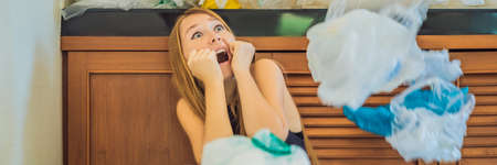 Woman used too many plastic bags that they filled up the entire kitchen. Zero waste concept. The...