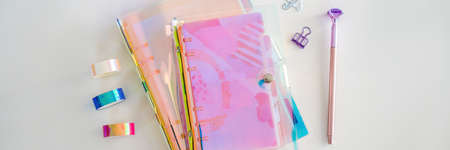 Notepad and stationery on white background. Planner for business and study. Fans of stationery BANNER, LONG FORMATの写真素材